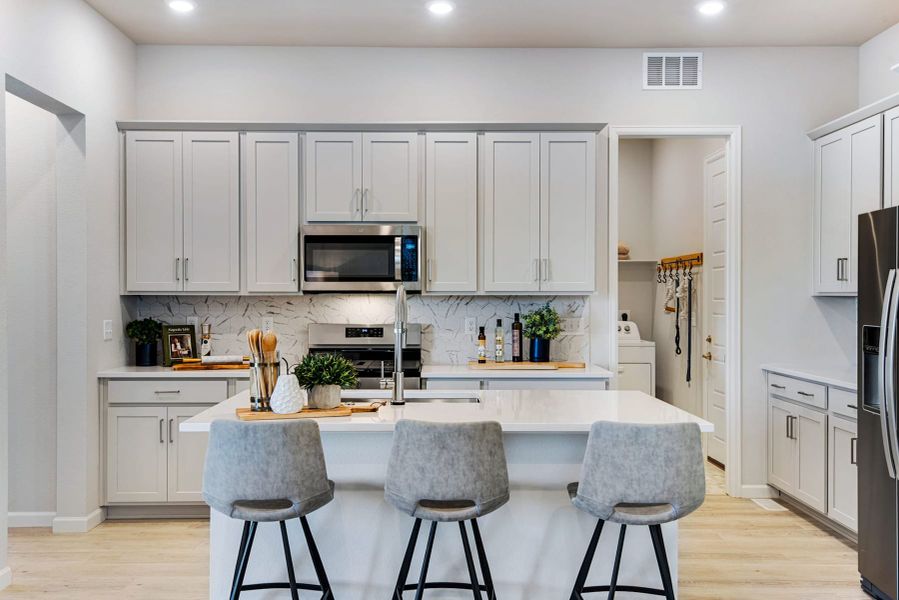 Representative furnished interior of a home built from the 3405 by Tri Pointe Homes in Westside Crossing, Berthoud (Image 11). Representative furnished interior of a home built from the 3405 by Tri Pointe Homes in Westside Crossing, Berthoud (Image 11).