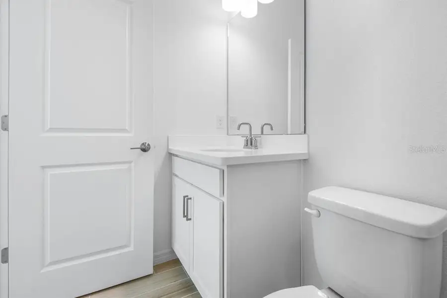 Furnished interior view inside a new home in Ardisia Park, New Smyrna Beach (Image 12).