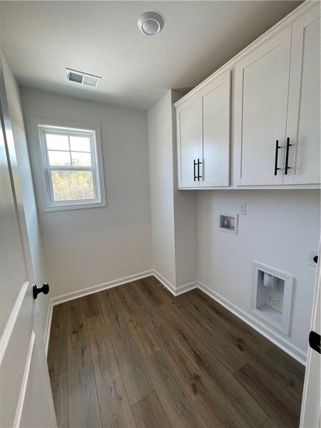 This clean and bright space offers convenient laun