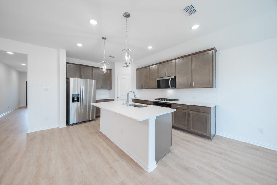 Furnished interior view inside a new home in Whitewing Trails, Princeton (Image 5).