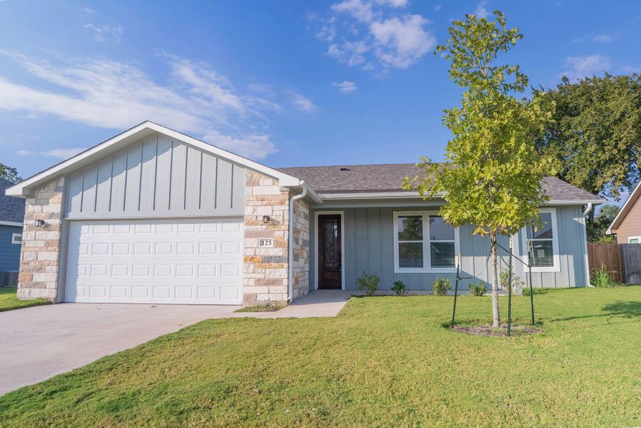 Ranch-style home featuring board and batten siding, a shingled roof, stone siding, and concrete driveway Ranch-style home featuring board and batten siding, a shingled roof, stone siding, and concrete driveway