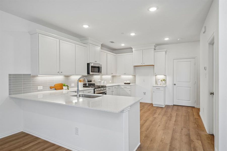 Open and inviting, this gorgeous kitchen is everything you have been searching for! Open and inviting, this gorgeous kitchen is everything you have been searching for!