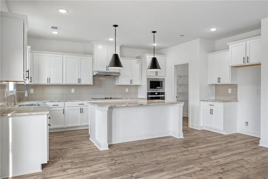 Furnished interior view inside a new home in , Buford (Image 5).