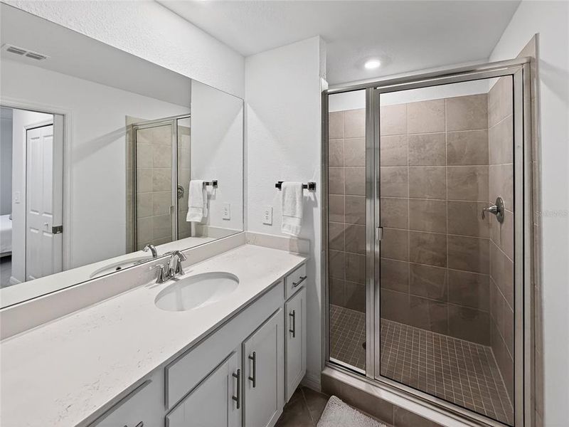 Furnished interior view inside a new home in Wellen Park Golf & Country Club, Venice (Image 26).