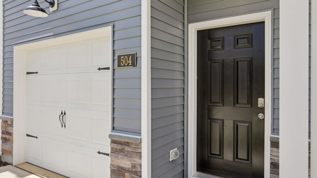Exterior details and patio area of a home in The Townes at Martin Farms, Aberdeen (Image 3). Exterior details and patio area of a home in The Townes at Martin Farms, Aberdeen (Image 3).
