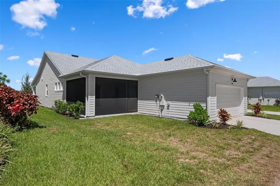 Front exterior of a new home in , Bradenton, FL, highlighting curb appeal (Image 1). Front exterior of a new home in , Bradenton, FL, highlighting curb appeal (Image 1).