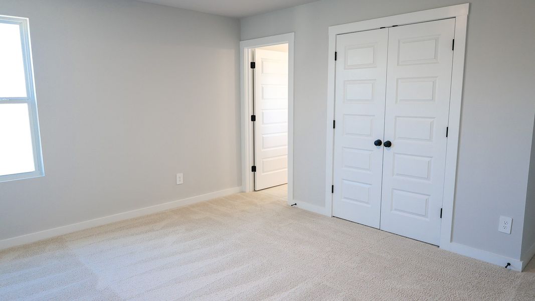 Representative unfurnished interior of a home built from the STONEBROOK II by D.R. Horton in Harvest Point, Spring Hill (Image 56).