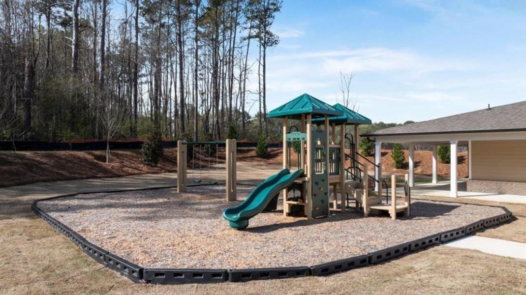 Front exterior of a new home in Fairhaven, Lithia Springs, GA, highlighting curb appeal (Image 36). Front exterior of a new home in Fairhaven, Lithia Springs, GA, highlighting curb appeal (Image 36).