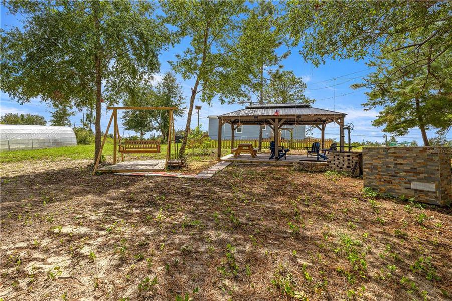 Front exterior of a new home in , Ocklawaha, FL, highlighting curb appeal (Image 14).