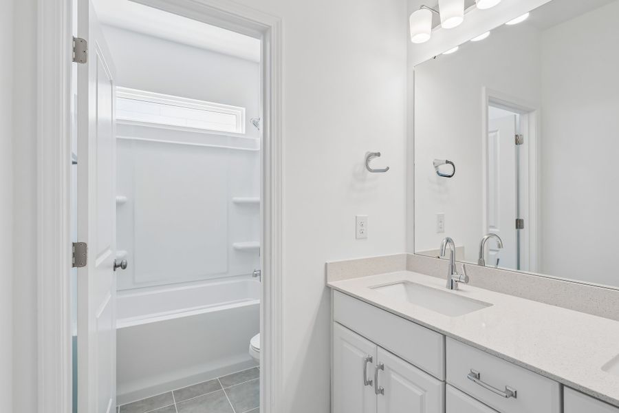 Furnished interior view inside a new home in Terraces at the Exchange, Indian Land (Image 11).