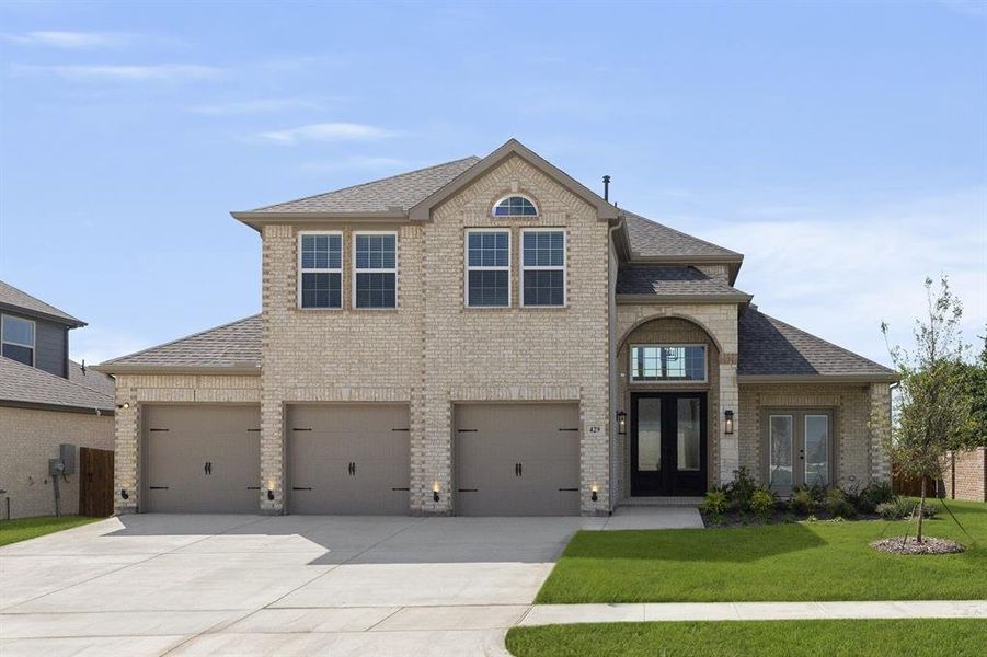 Front exterior of a new home in Woodcreek, Rockwall, TX, highlighting curb appeal (Image 18).