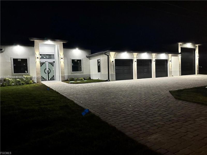 Front exterior of a new home in , Cape Coral, FL, highlighting curb appeal (Image 19).