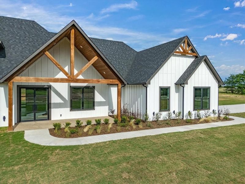 Front exterior of a new home in , Alvord, TX, highlighting curb appeal (Image 27).