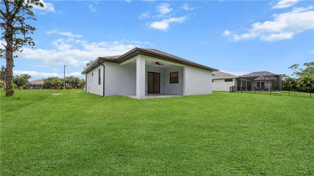 Exterior details and patio area of a home in , Rotonda West (Image 23).