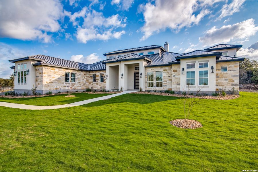 Front exterior of a new home in , Bulverde, TX, highlighting curb appeal (Image 1). Front exterior of a new home in , Bulverde, TX, highlighting curb appeal (Image 1).