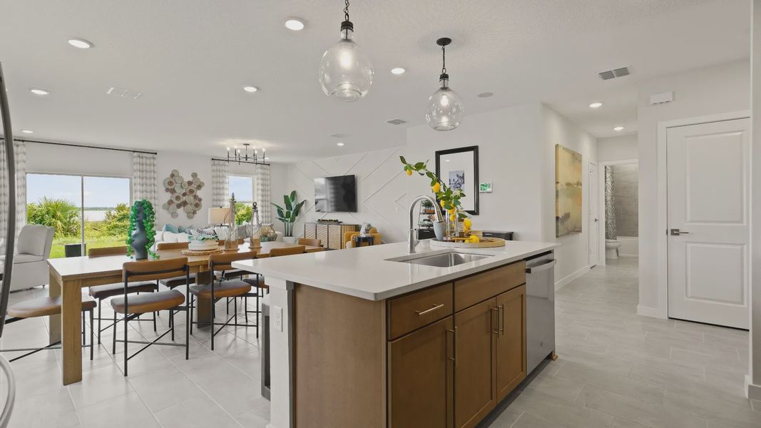 Castaway Kitchen and Dining Area, new home plan available at Liberty Trace in Haines City, fl
