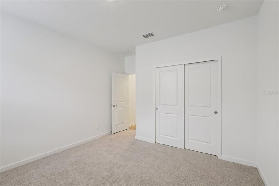 Spacious, unfurnished interior of a new home in Colbert Landings, Palm Coast (Image 31).