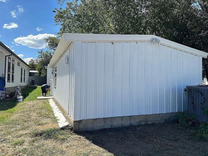 Exterior details and patio area of a home in , Tow (Image 3). Exterior details and patio area of a home in , Tow (Image 3).