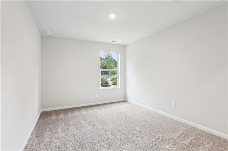 Spacious, unfurnished interior of a new home in The Hills at Cedar Creek, Winder (Image 27).