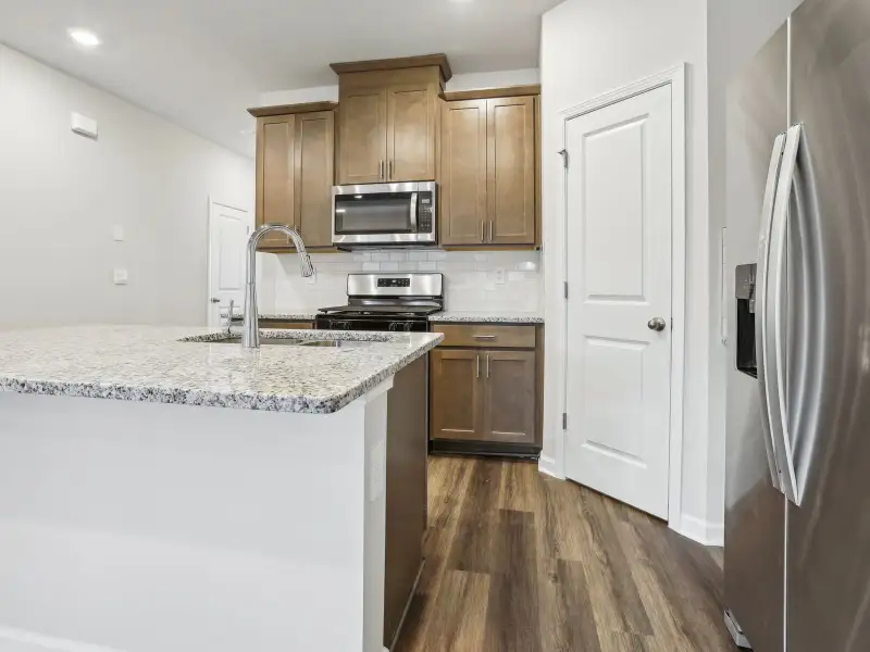 Furnished interior view inside a new home in Brooks Lake, Loganville (Image 6).