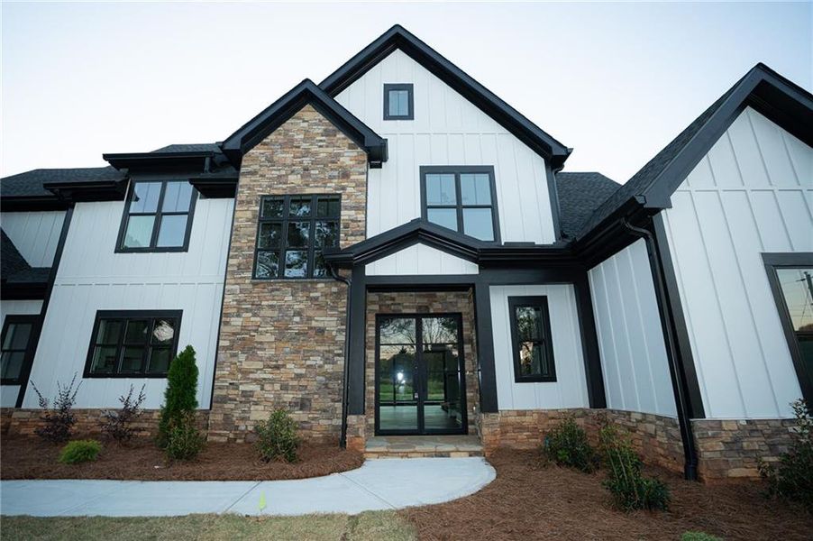 Front exterior of a new home in , Cumming, GA, highlighting curb appeal (Image 2). Front exterior of a new home in , Cumming, GA, highlighting curb appeal (Image 2).
