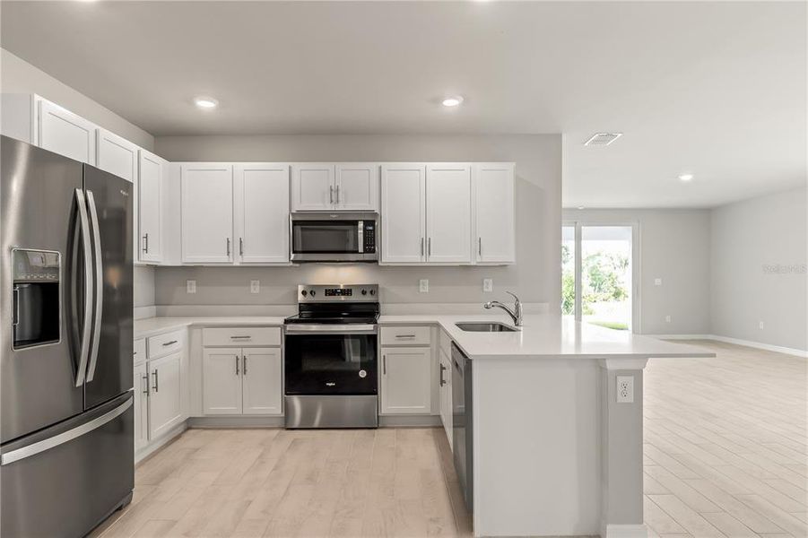 Furnished interior view inside a new home in Sea Cove, Punta Gorda (Image 6). Furnished interior view inside a new home in Sea Cove, Punta Gorda (Image 6).
