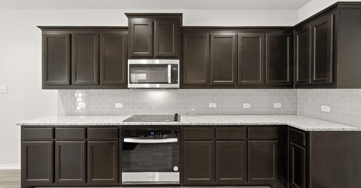 Representative exterior photo of a completed home built from the Hadleigh by Impression Homes in Mountain Valley, Burleson, TX (Image 8). Representative exterior photo of a completed home built from the Hadleigh by Impression Homes in Mountain Valley, Burleson, TX (Image 8).