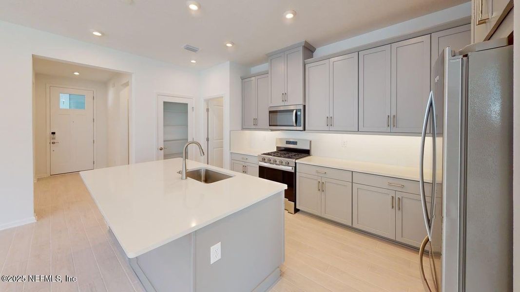 Furnished interior view inside a new home in RiverTown - WaterSong, St. Johns (Image 7).