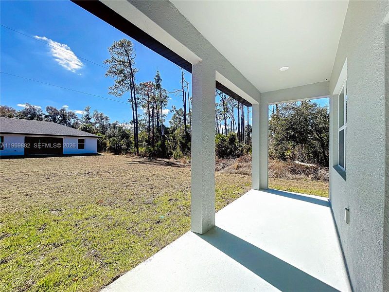 Exterior details and patio area of a home in , Port Charlotte (Image 3).