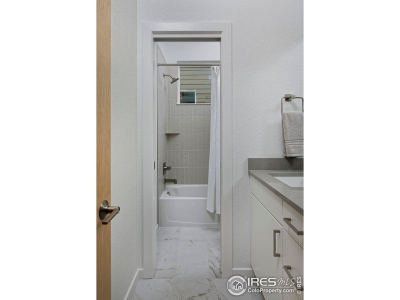 Secondary bathroom with pocket door Secondary bathroom with pocket door