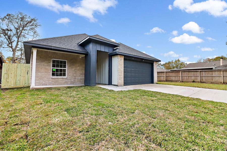 Front exterior of a new home in , Crosby, TX, highlighting curb appeal (Image 1).