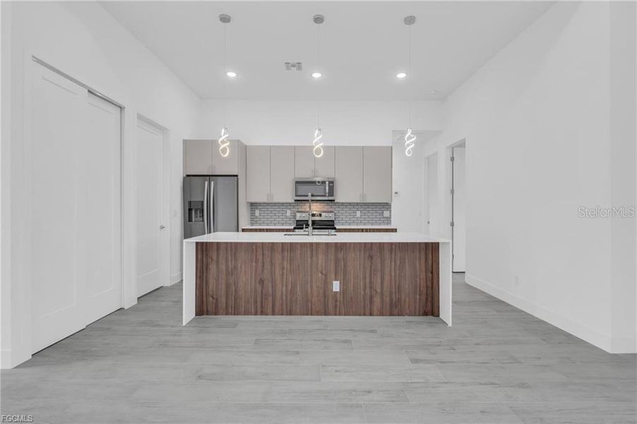 Furnished interior view inside a new home in , Port Charlotte (Image 9).