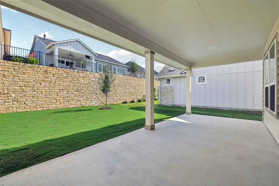 View of patio with a ceiling fan