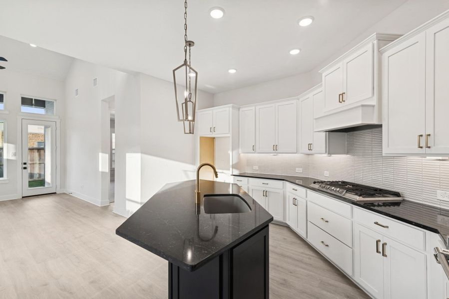 Furnished interior view inside a new home in The Highlands - Grove Collection, Porter (Image 8).