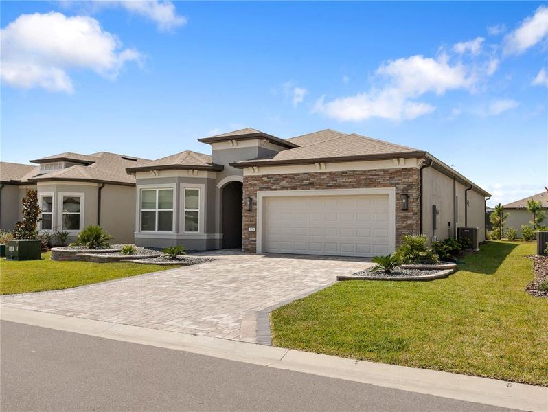 Front exterior of a new home in , Ocala, FL, highlighting curb appeal (Image 27).