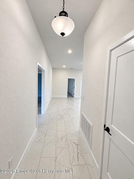 Spacious, unfurnished interior of a new home in Winding Oaks, Weeki Wachee (Image 6).