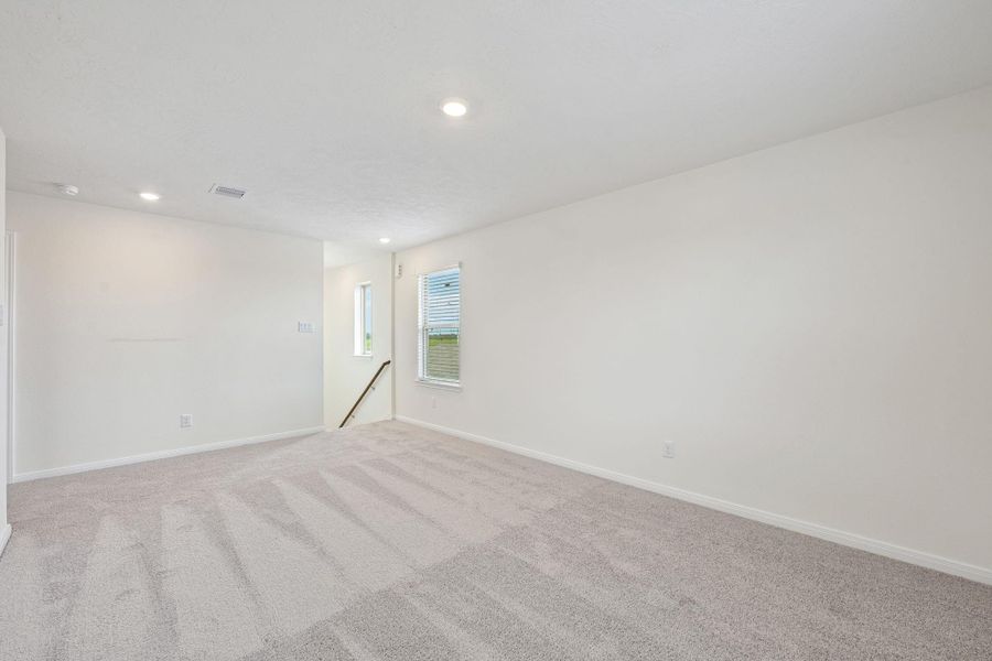 Head upstairs and enjoy the Loft—an additional living area perfect for a game room, media space, or a peaceful retreat.