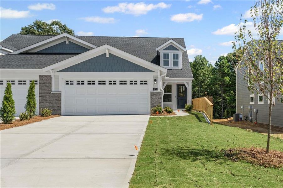 Front exterior of a new home in Villas at Gold Creek, Dawsonville, GA, highlighting curb appeal (Image 17).