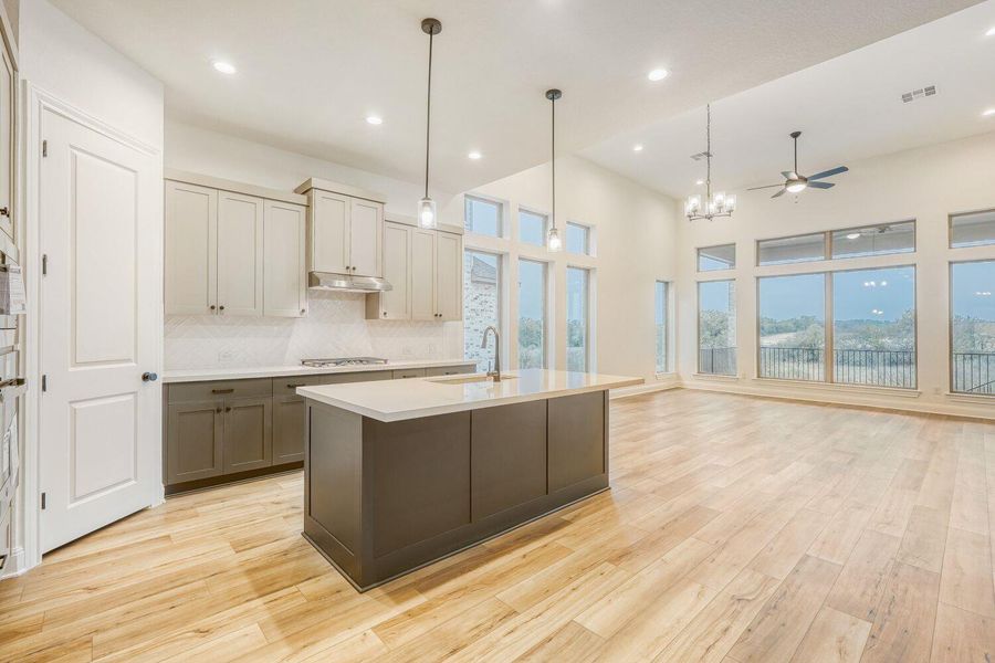 Furnished interior view inside a new home in 6 Creeks, Kyle (Image 4).