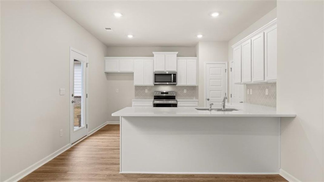 Furnished interior view inside a new home in , Winder (Image 7). Furnished interior view inside a new home in , Winder (Image 7).
