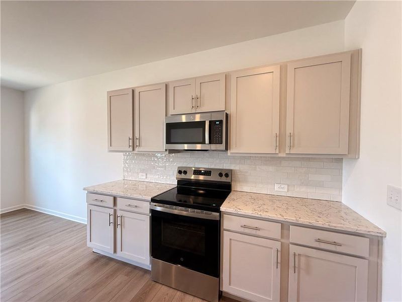 Furnished interior view inside a new home in Leydenview, Mableton (Image 19).