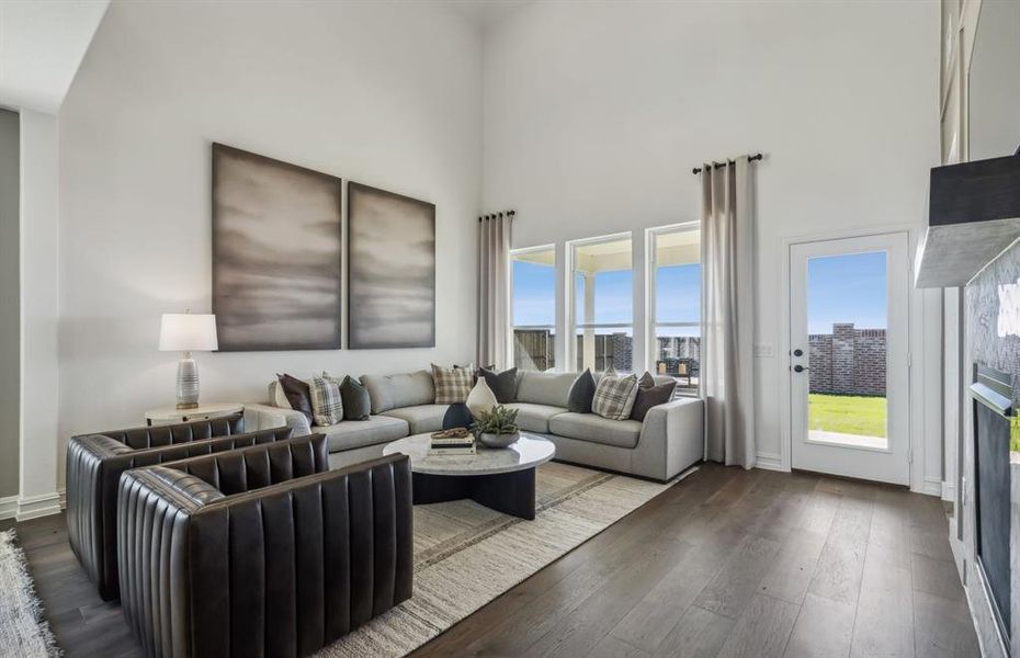 Spacious gathering room with large windows *Model Representation*