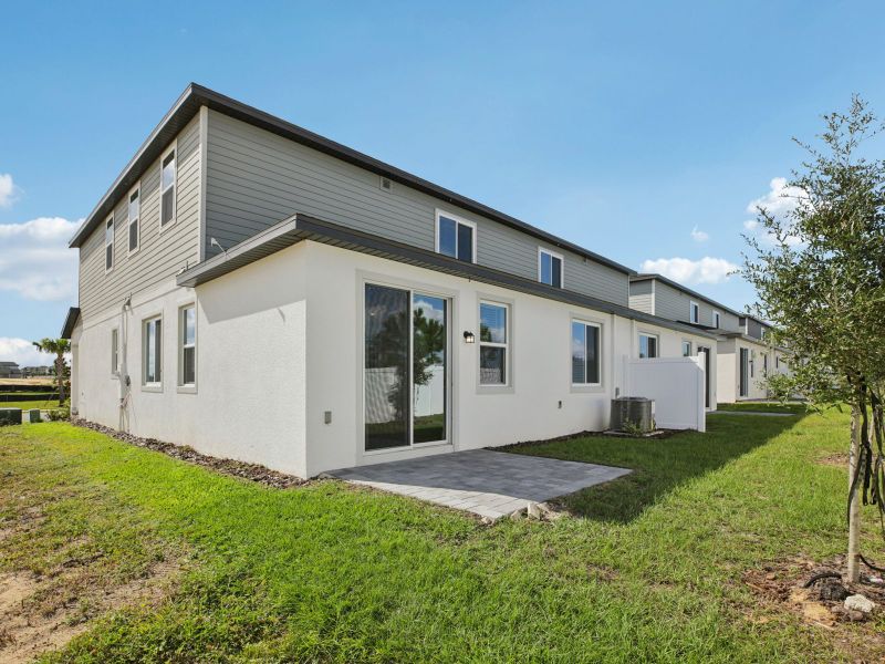 Exterior details and patio area of a home in Cyrene at Minneola - Villas, Minneola (Image 2). Exterior details and patio area of a home in Cyrene at Minneola - Villas, Minneola (Image 2).