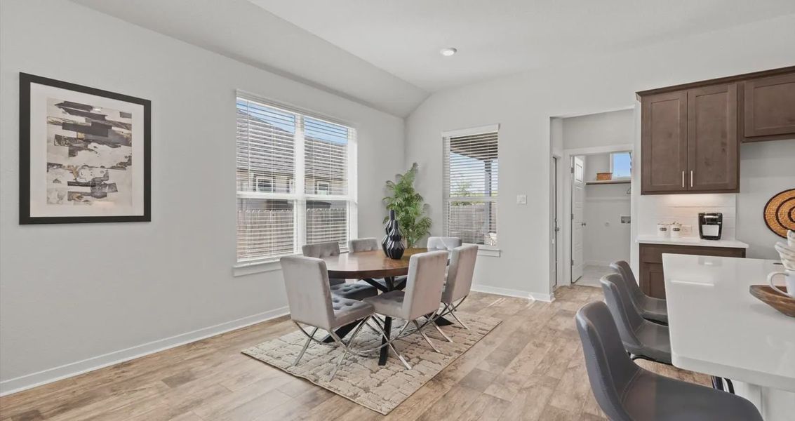 Representative furnished interior of a home built from the Avril by Chesmar Homes in Stream Waters, Buda (Image 18).
