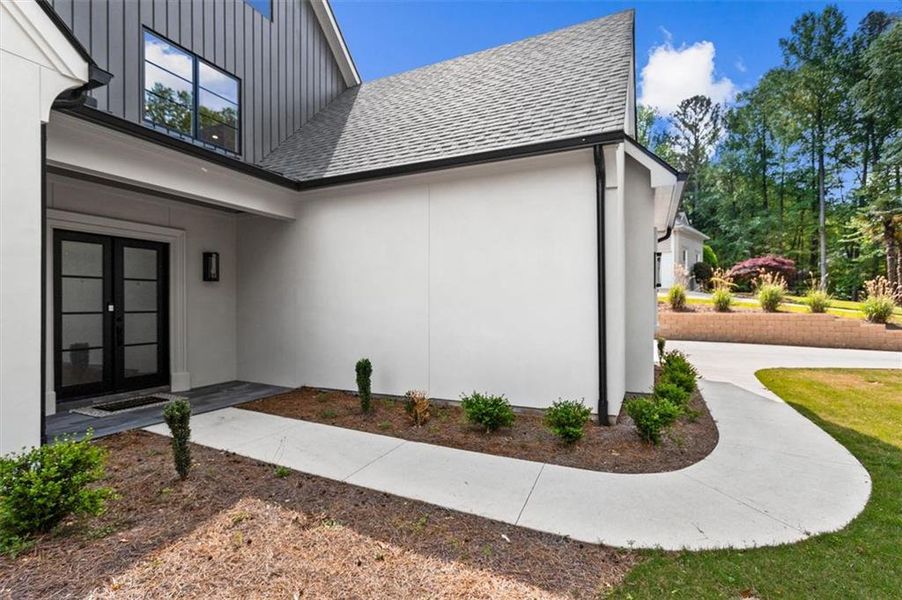 Front exterior of a new home in , Hoschton, GA, highlighting curb appeal (Image 2). Front exterior of a new home in , Hoschton, GA, highlighting curb appeal (Image 2).