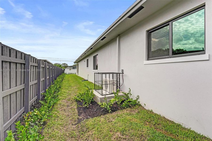 Front exterior of a new home in , West Park, FL, highlighting curb appeal (Image 29). Front exterior of a new home in , West Park, FL, highlighting curb appeal (Image 29).