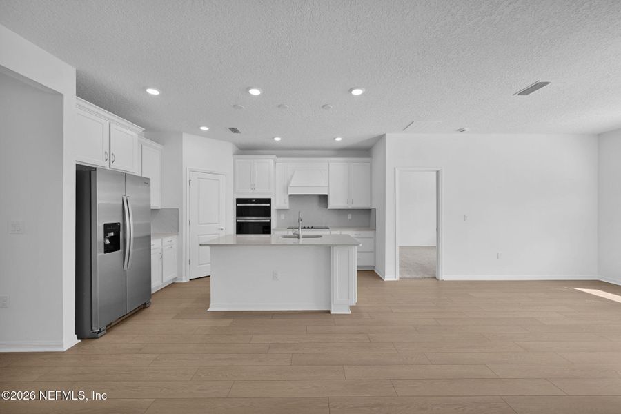 Furnished interior view inside a new home in Hyland Trail, Green Cove Springs (Image 7).