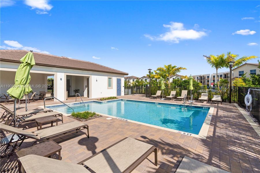 Exterior details and patio area of a home in Harmony Parc, Homestead (Image 4).