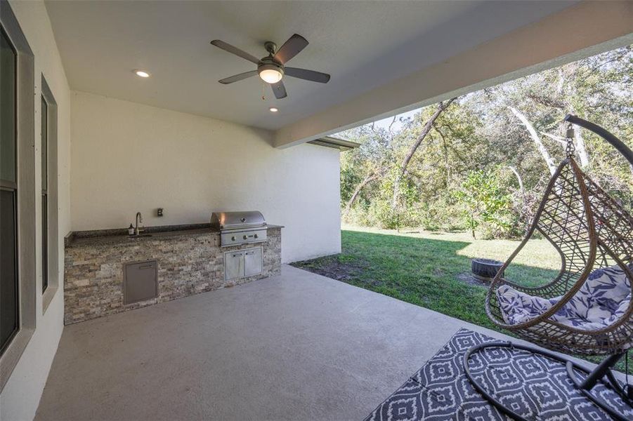 Exterior details and patio area of a home in Bella Terra, Hudson (Image 23).