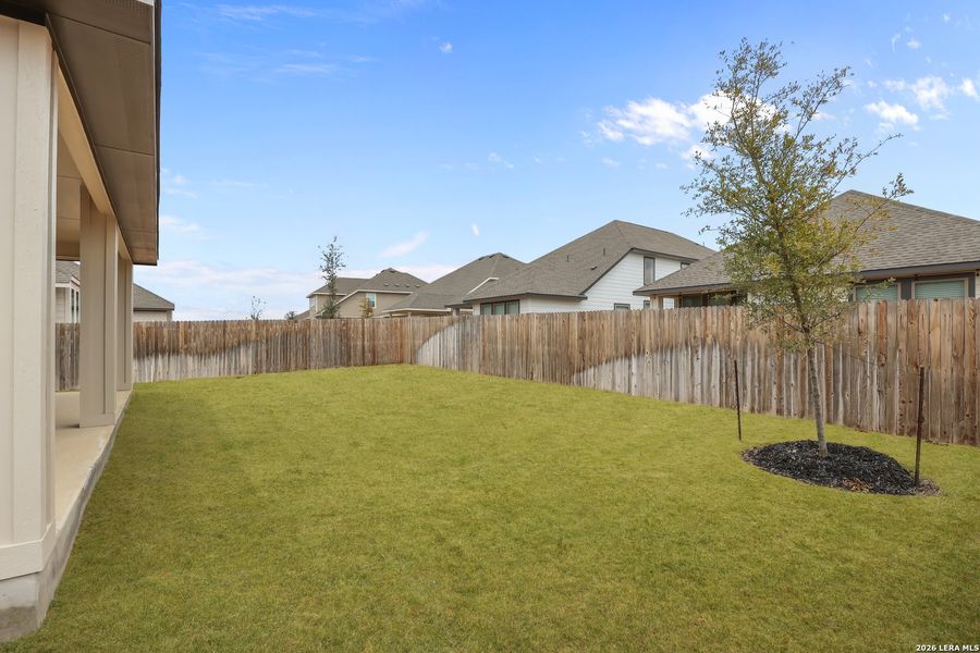 Exterior details and patio area of a home in Megan's Landing, Castroville (Image 4).